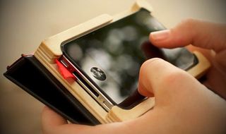 Illustration for article titled Hide Your iPhone 4 In A Little Black Book